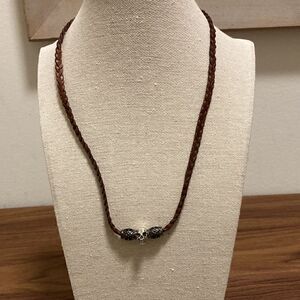Handcrafted Necklace with Skull Pendant on Brown Braided Leather cord.